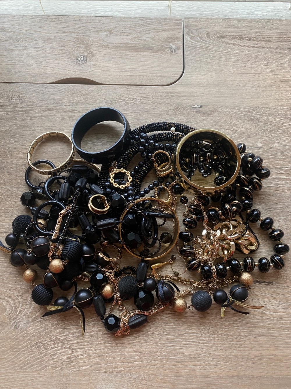 Costume Jewelry Lot: Black and Gold Tone Necklaces, Bracelets, Earings
